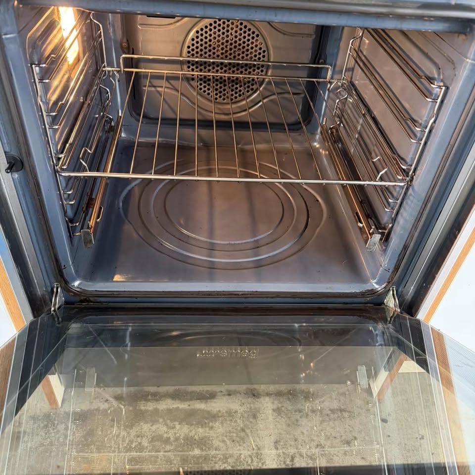 Clean single oven with clear glass door after eco-friendly oven clean